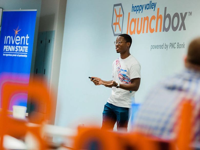 A student presenting at a Penn State Launch Box