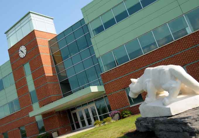 The three-story Saucon building, with the lion shrine statue out front, serves as the main campus of Penn State Lehigh Valley.